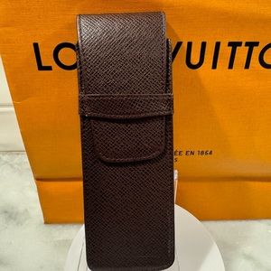 Louis Vuitton Pouch.